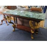An Empire style rectangular topped console table having a marble effect top supported by two