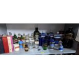 A collection of Victorian glass and ceramic Pharmacy and Chemist bottles and jars to include a large