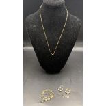 A 9ct gold necklace, together with a 9ct gold earring having pearls 1.2g, along with a yellow
