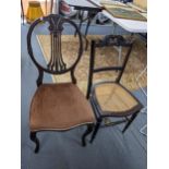 Two late 19th/early 20th century mahogany chairs to include one having a pierced splat back and on