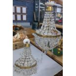 A pair of mid 20th century gilt metal and crystal drop chandeliers Location: