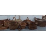 A quantity of wicker baskets to include flower baskets Location: