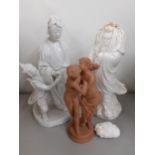 19th century Blanc de chine Oriental figures A/F, and a terracotta group of an embracing couple,