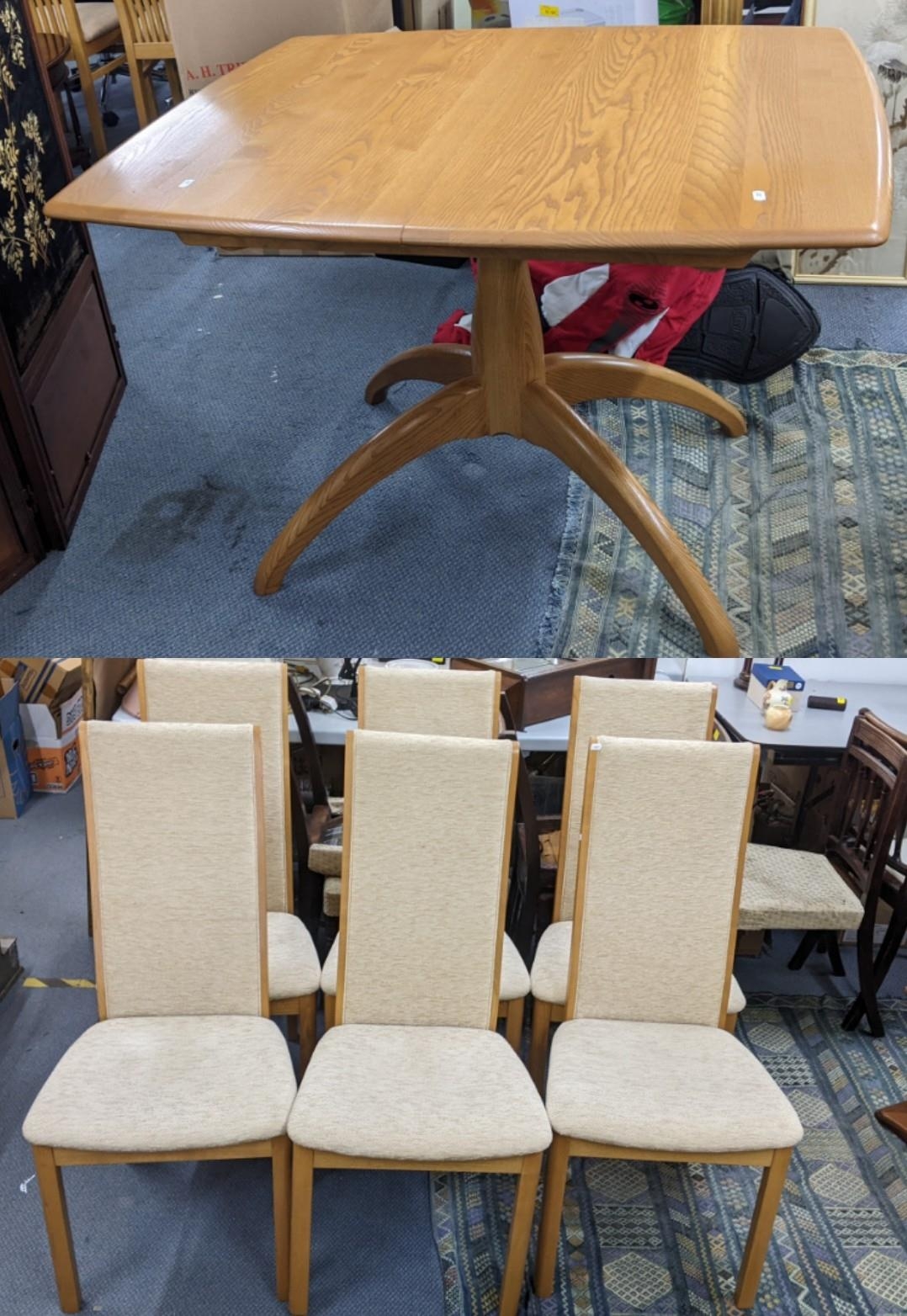 An Ercol Windsor elm extending dining table, model 1992, 73cm h x 104cm w, together with a set of