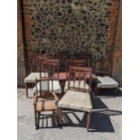 A set of six 19th century mahogany dining chairs with carved splat backs, a child's rocking chair