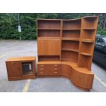 A G-plan teak retro corner wall unit together with a G-plan cabinet with glazed door Location: