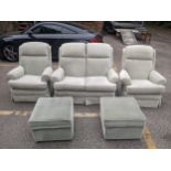 A G-plan two seater sofa, two armchairs and a pair of matching footstools Location: