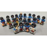 A collection of Robertson Marmalade golly figures, footballers and a band Location: These items