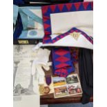 A Masonic case containing two aprons, medals, black tie and other items Location: