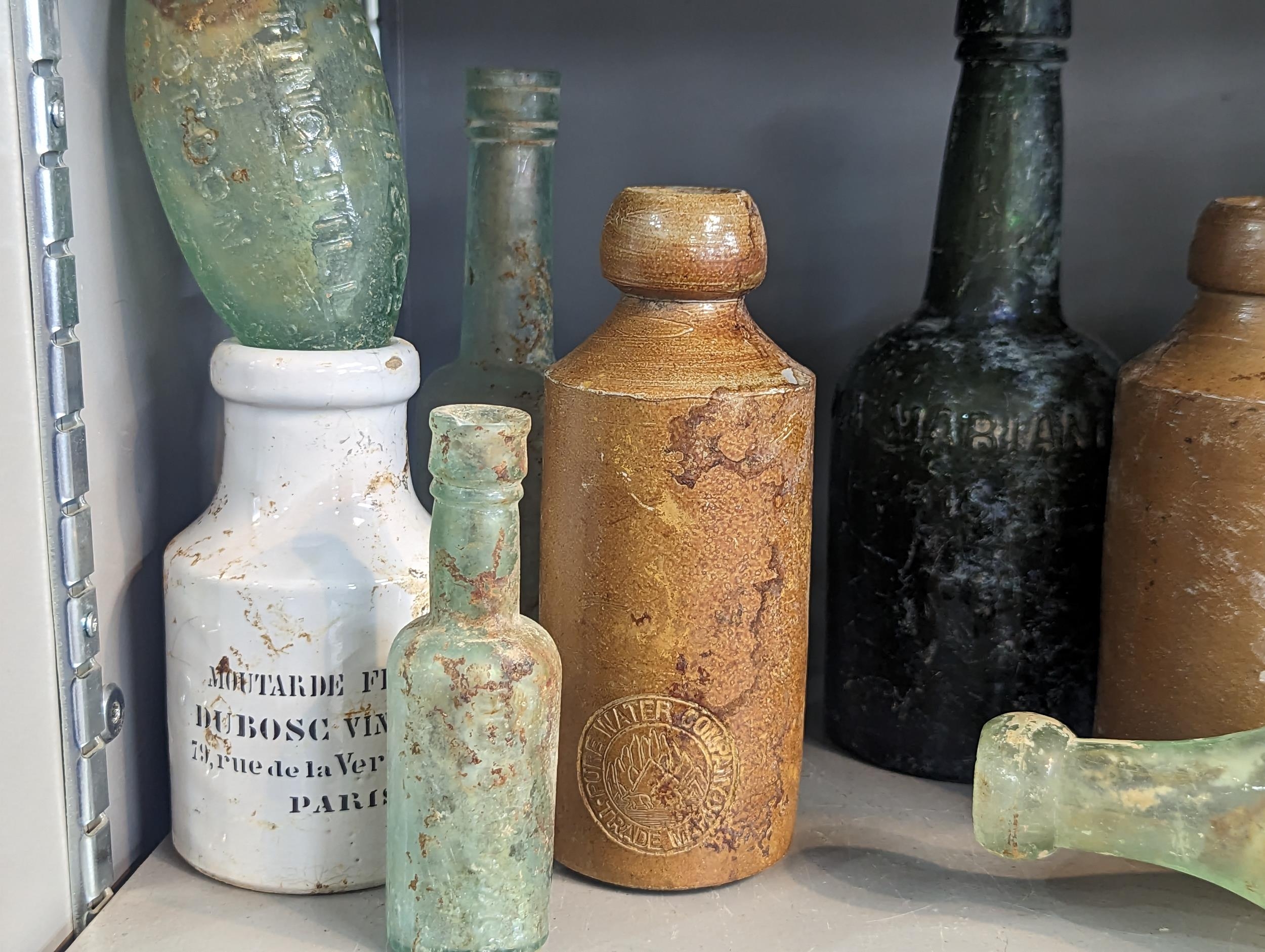 A group of mixed 18th/19th century glass and stoneware bottles and flasks A/F, to include - Image 2 of 7