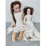 Two early 20th century bisque headed dolls to include Armand Marseille and Simon and Halbig