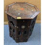 A late 19th/early 20th century Indian octagonal carved occasional table having mother of pearl