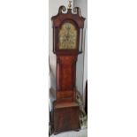 A George III mahogany 8 day longcase clock having a broken swan neck pediment and gilt brass dial,