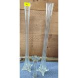 A pair of early 20th century tall clear glass slender vases, and another Location: