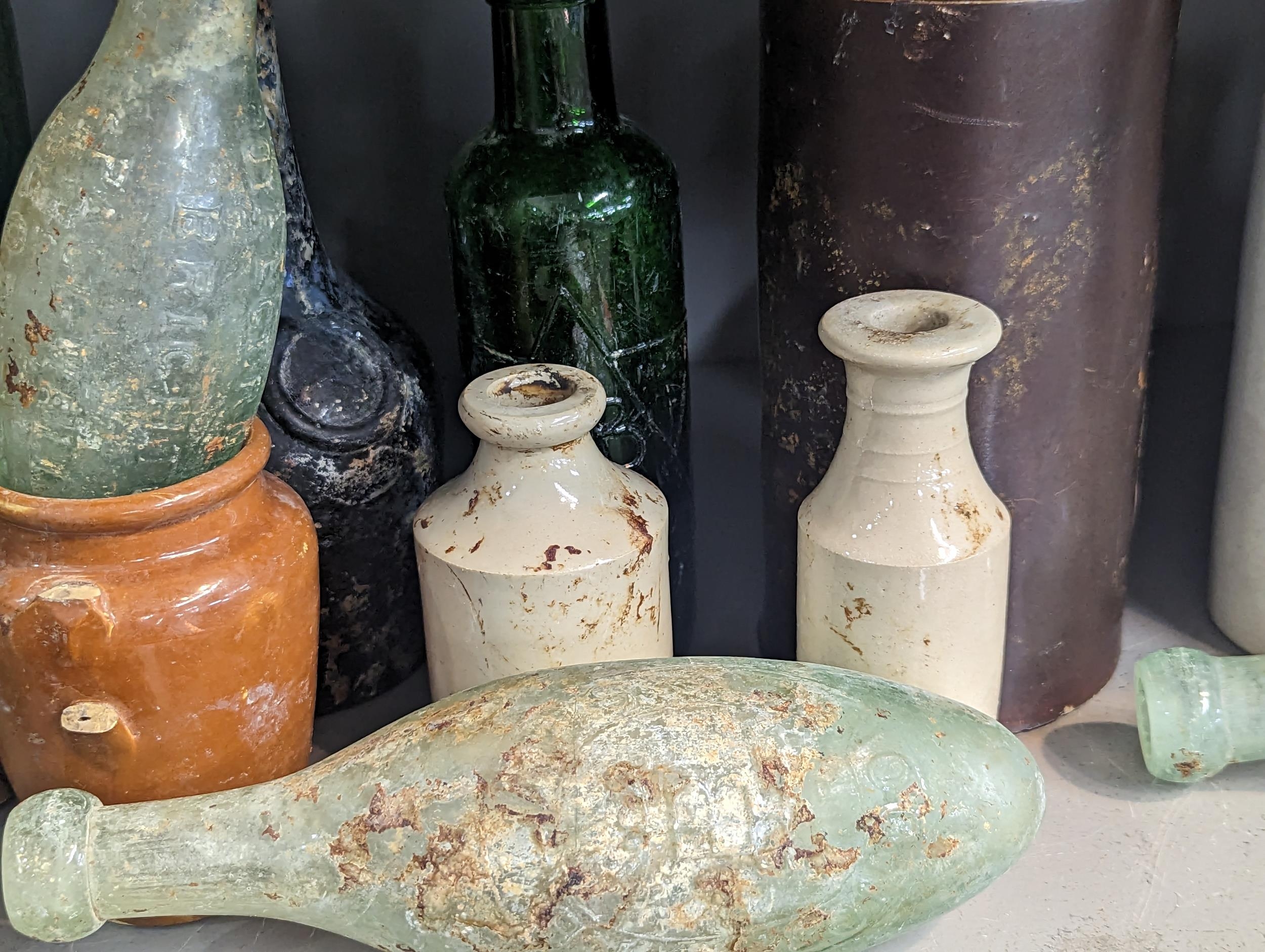 A group of mixed 18th/19th century glass and stoneware bottles and flasks A/F, to include - Image 5 of 7