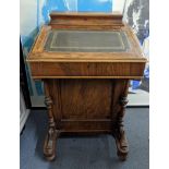 A Victorian walnut Davenport with a hinge top, four drawers on turned feet 54cm x 84cm Location: