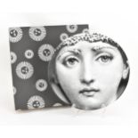 A Piero Fornasetti (1913-88) plate, 'Tema & Variazioni', model 241, makers stamp to back, in