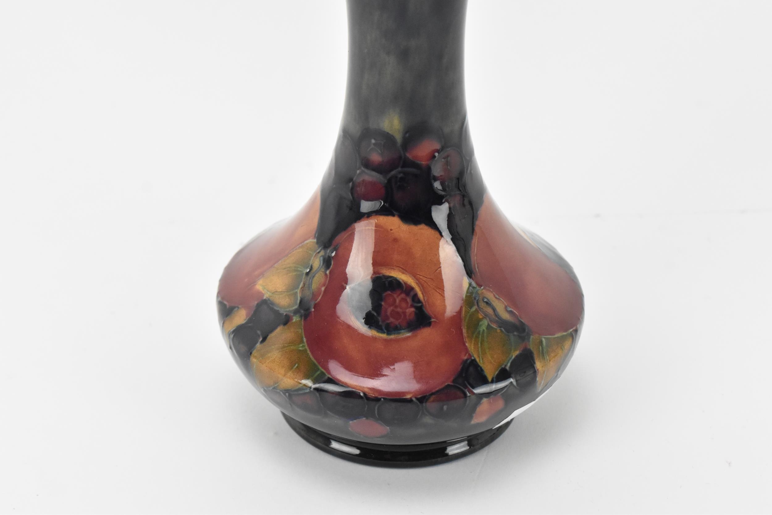 A Moorcroft pottery vase by Walter Moorcroft (1917-2002), in the 'Pomegranate' pattern, with - Image 3 of 7