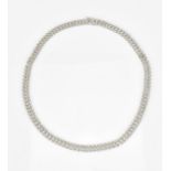 An 18ct white gold and diamond necklace, designed with a double row of flat circular links