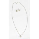An 18ct white gold, yellow gold and diamond pendant on chain, with matching earrings, the pendant