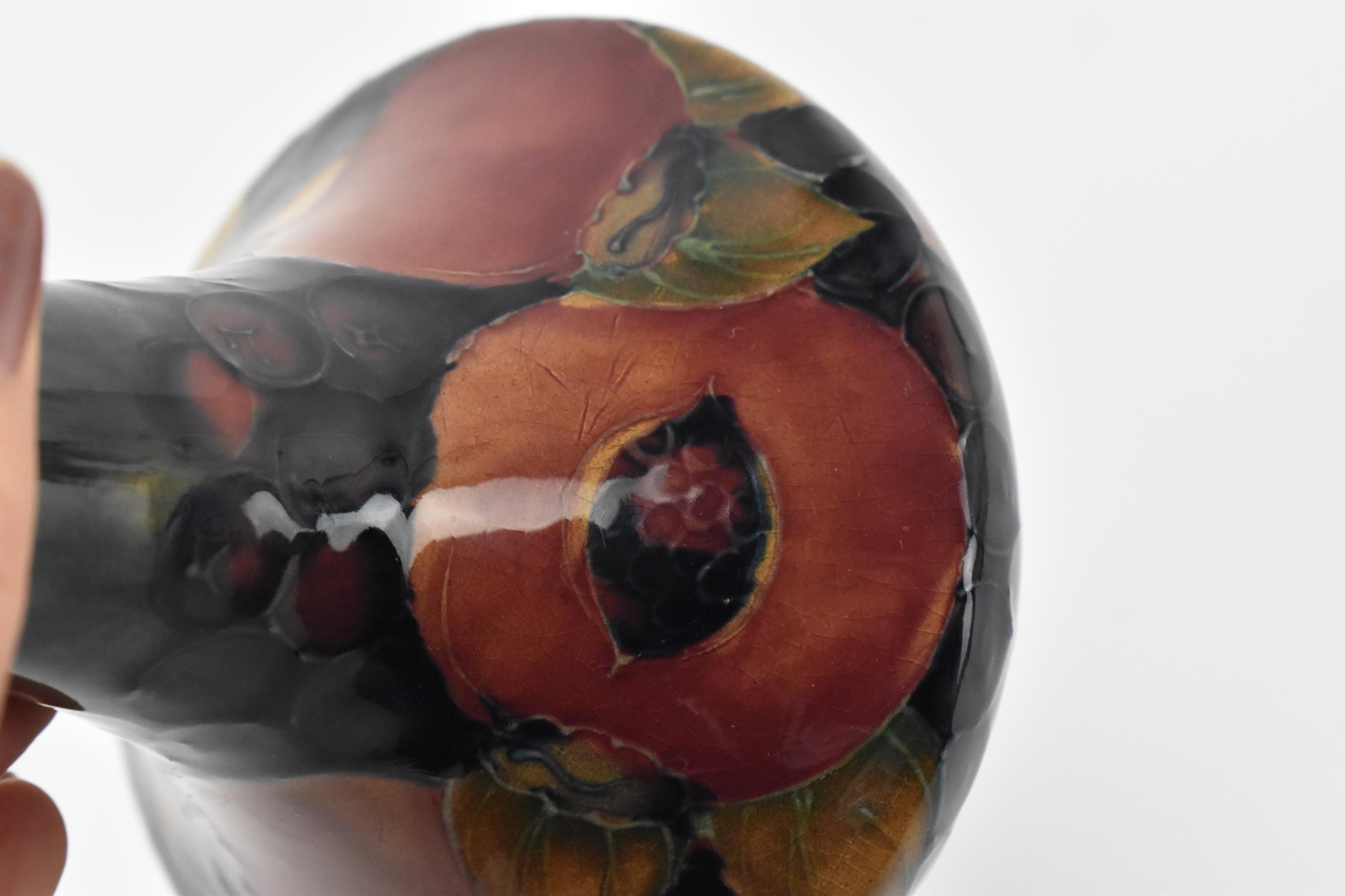 A Moorcroft pottery vase by Walter Moorcroft (1917-2002), in the 'Pomegranate' pattern, with - Image 4 of 7