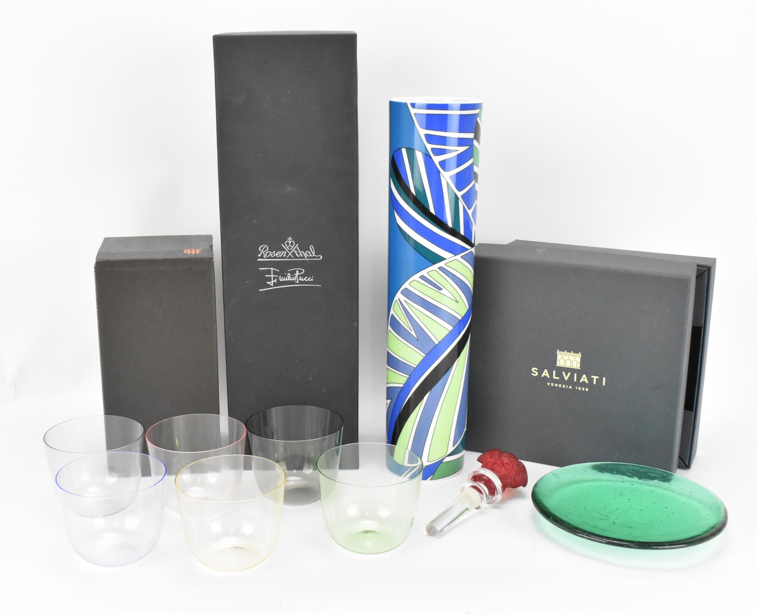 A small collection of modern glass, comprising a Rosenthal for Versace red and clear glass bottle