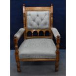 A Victorian oak Gothic Revival armchair by Gillows, possibly designed by Bruce J Talbert (1838-1881)