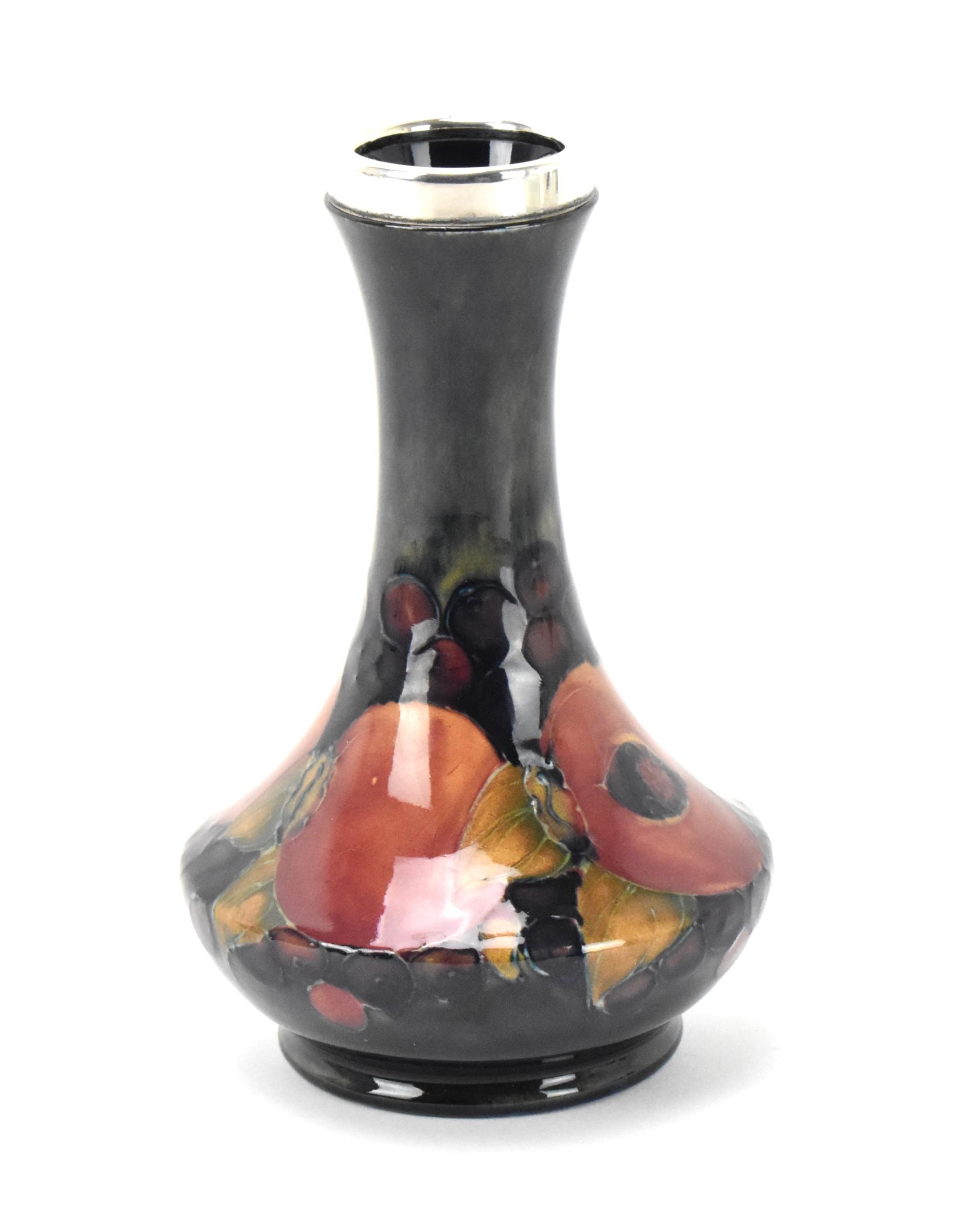 A Moorcroft pottery vase by Walter Moorcroft (1917-2002), in the 'Pomegranate' pattern, with