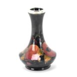 A Moorcroft pottery vase by Walter Moorcroft (1917-2002), in the 'Pomegranate' pattern, with