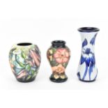 Three small Moorcroft pottery vases, to include one in the Castle Garden' pattern by Debbie Hancock,