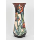 A Moorcroft pottery 'Red Tulip' vase, designed by Sally Tuffin, painted by Sharon Austin, circa