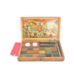 A small 19th century artist colour box, circa 1880, containing some original paint/watercolour