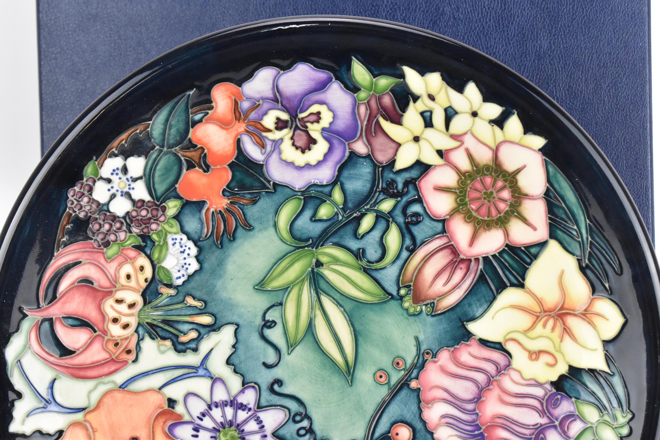 A Moorcroft pottery 'Carousel' charger designed by Rachel Bishop, painted by Sharon Austin, 1996, - Image 2 of 5