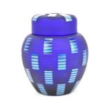 An Okra studio glass 'Manhattan Blue' lidded ginger jar, with ribbed detail and iridescent