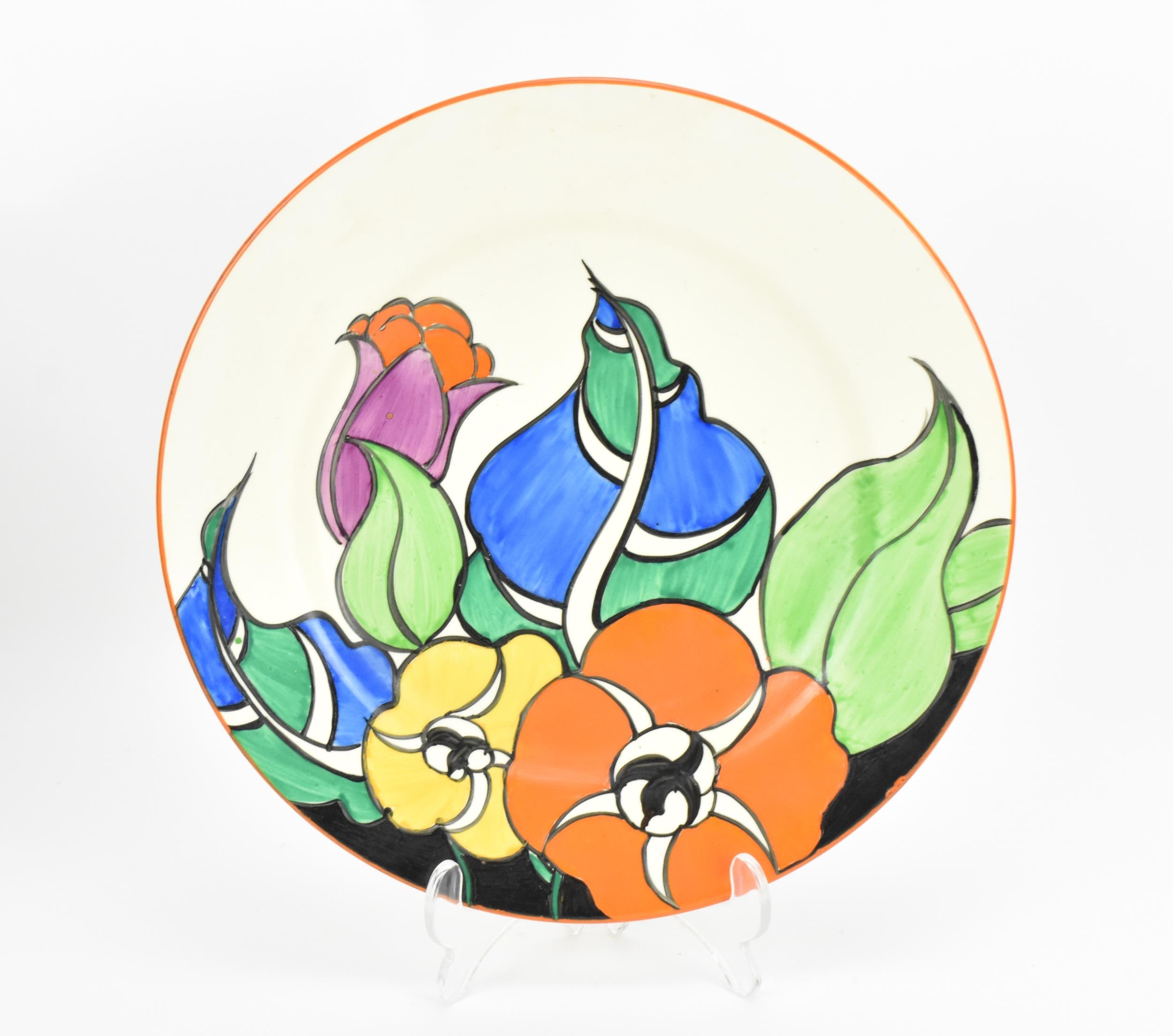 A large Clarice Cliff 'Bizarre' plate in the 'Latona' pattern, circa 1930s, with factory stamp to