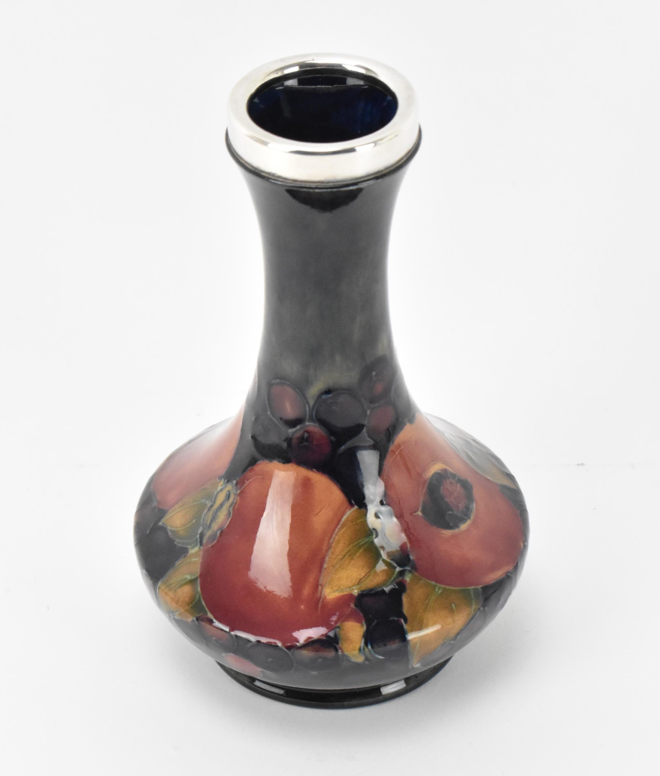 A Moorcroft pottery vase by Walter Moorcroft (1917-2002), in the 'Pomegranate' pattern, with - Image 2 of 7