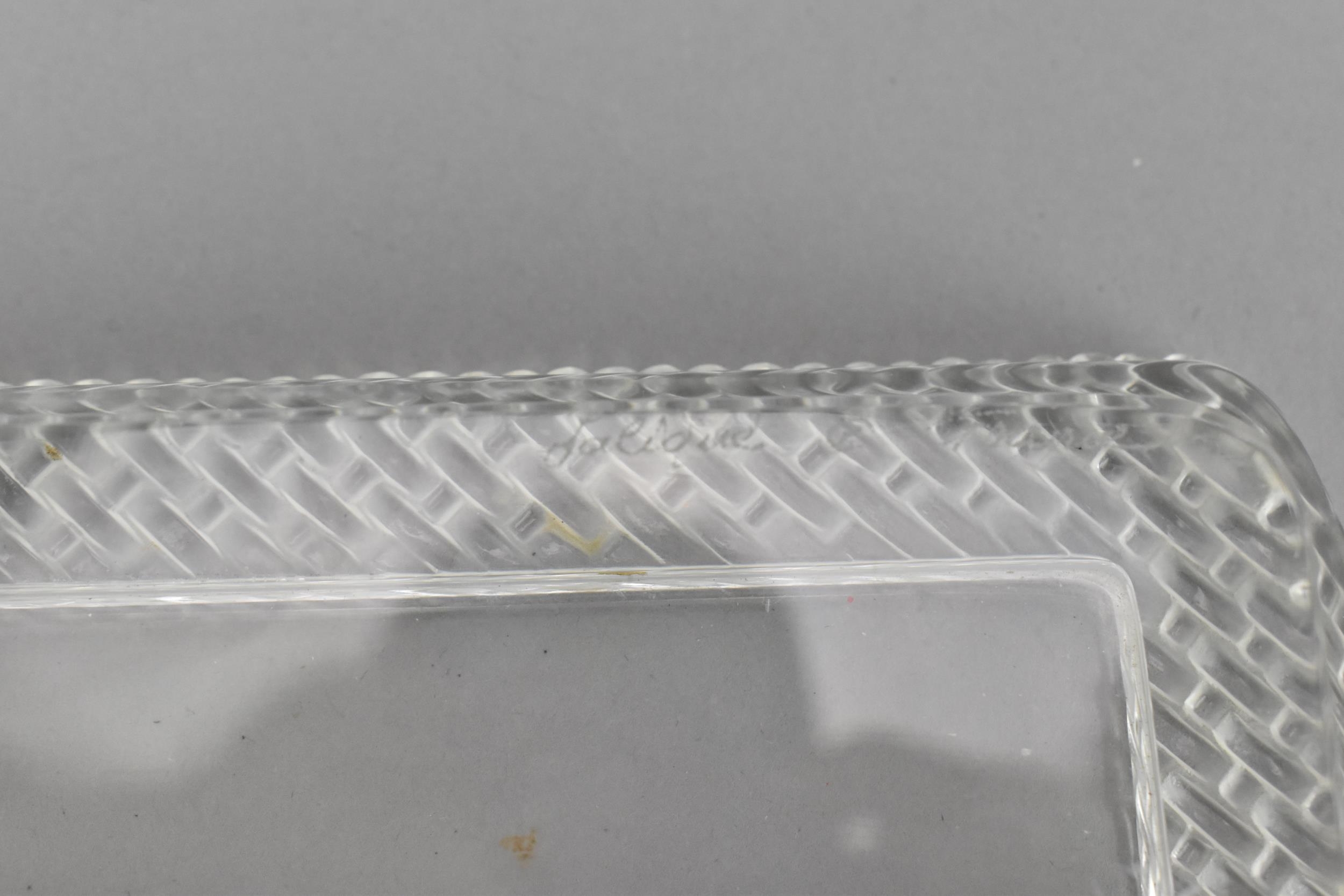 A Lalique clear glass rectangular tray, post 1980, with woven pattern border, the underside with - Image 6 of 7