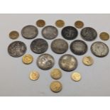 A collection of replica/restruck British coinage to include 1934 and 1937 crowns, 1911 Trade dollar,