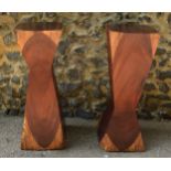 A pair of exotic hardwood decorative stands by Fitzhugh Karol, 67 cm high, as seen in 'House &