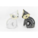 A pair of mid-century ceramic cats by Leopold Anzengruber, Vienna Austria, one in black glaze, the