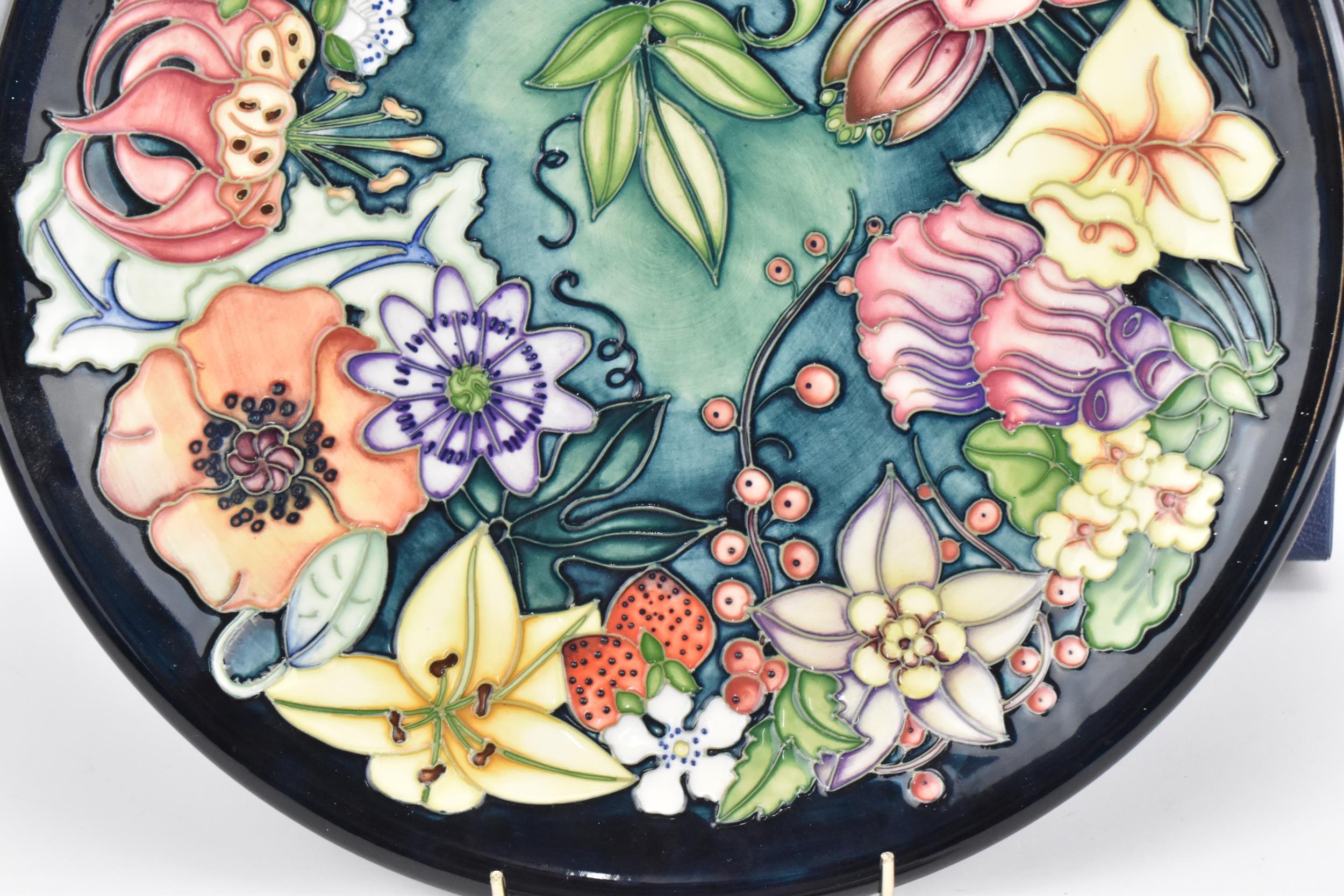 A Moorcroft pottery 'Carousel' charger designed by Rachel Bishop, painted by Sharon Austin, 1996, - Image 3 of 5