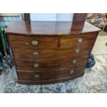 A George III mahogany bow fronted chest of two sort and three long drawers, 98cm h x 129cm w