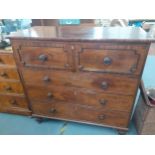 A Victorian secretaire having three drawers below a drop down drawer with fitted desk compartments