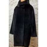 Aquascutum-An unworn ladies black alpaca and woollen mix three quarter length coat with original