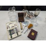 A mixed lot to include silver dressing table brushes and mirror, along with silver plate,