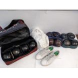 Three sets of bowling balls to include Sterling Gold Size 1 Medium, trainers and waterproofs