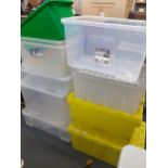 A quantity of plastic storage boxes. Location:A3F