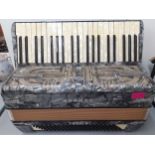 A Hohner Verdi III 120 button piano accordion with marbled, grey finish, no case Location: