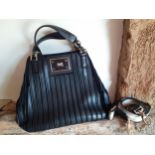 Anya Hindmarch- A black leather suede 'Belvedere' shoulder bag having a design of black leather