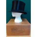 A mid 19th Century Carsell of Glasgow black silk top hat, approx 51cm internal circumference,
